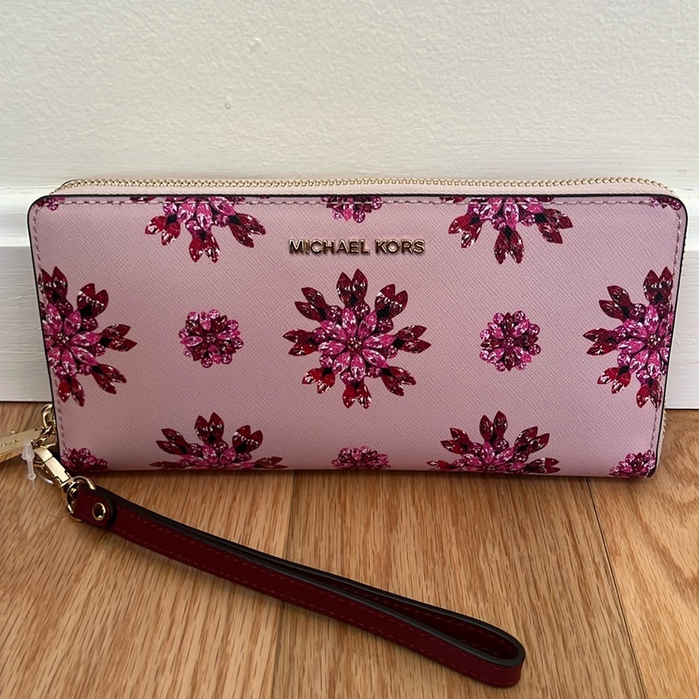 New! Michael Kors soft pink and ultra pink zippered continental wallet.